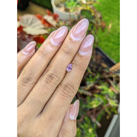 0.61 Ct. Purplish Pink Sapphire from Ceylon (Sri Lanka) Life Style