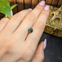 1.57 Ct. Yellowish Green Sapphire from Madagascar Life Style