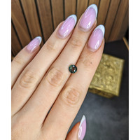 1.62 Ct. Bluish Green Sapphire from Madagascar Life Style