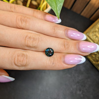 2.19 Ct. Bluish Green Sapphire from Madagascar Life Style