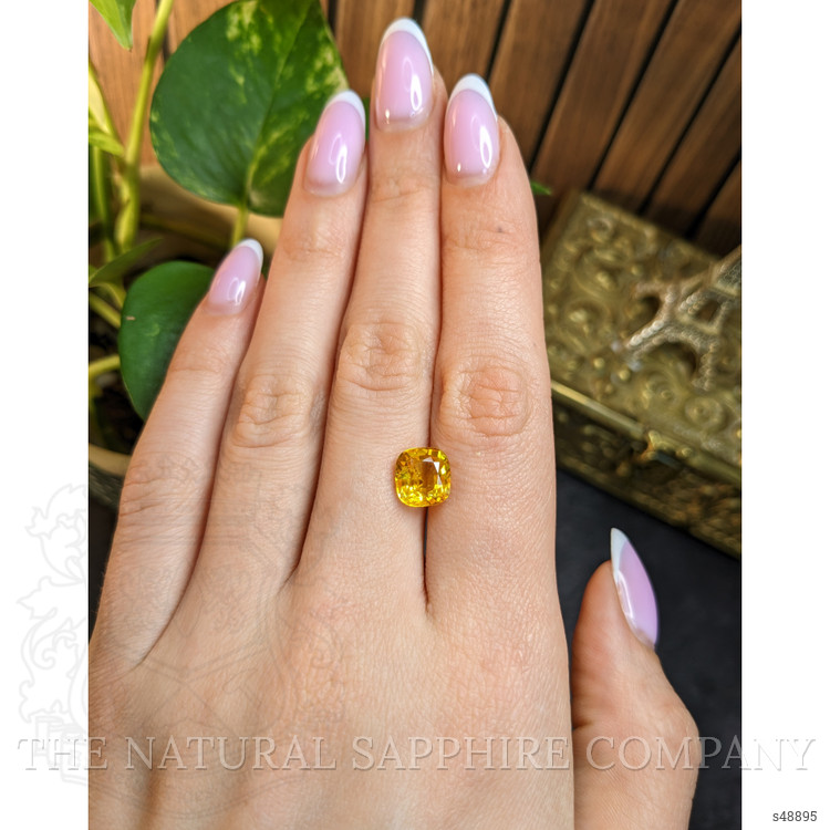 4.02 Ct. Orangish Yellow Sapphire from Ceylon (Sri Lanka)