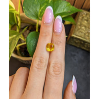 4.02 Ct. Orangish Yellow Sapphire from Ceylon (Sri Lanka) Life Style