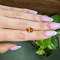 4.19 Ct. Yellowish Orange Sapphire from Ceylon (Sri Lanka) Life Style