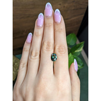 3.02 Ct. Bluish Green Sapphire from Madagascar Life Style