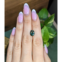 3.02 Ct. Bluish Green Sapphire from Madagascar Life Style