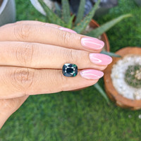 4.02 Ct. Bluish Green Sapphire from Madagascar Life Style