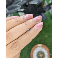 0.13 Ct. Purplish Blue Sapphire from Tanzania Life Style