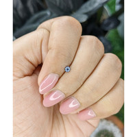 0.13 Ct. Purplish Blue Sapphire from Tanzania Life Style