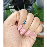 0.90 Ct. Greenish Blue Sapphire from Madagascar Life Style