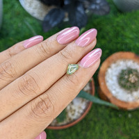 1.03 Ct. Yellowish Green Sapphire from Madagascar Life Style