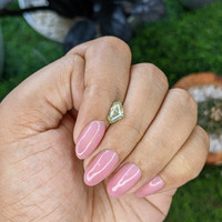 1.03 Ct. Yellowish Green Sapphire from Madagascar Life Style