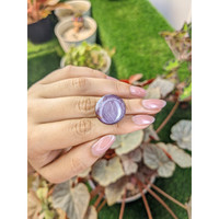 54.38 Ct. Purple Cabochon Sapphire from Madagascar Life Style