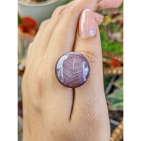 54.38 Ct. Purple Cabochon Sapphire from Madagascar Life Style