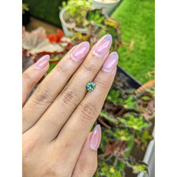 1.17 Ct. Bluish Green Sapphire from Madagascar Life Style