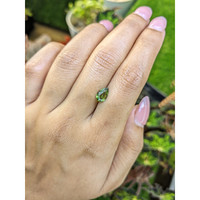 1.11 Ct. Yellowish Green Sapphire from Madagascar Life Style