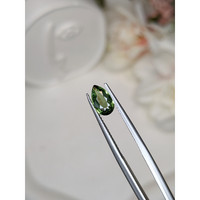 1.11 Ct. Yellowish Green Sapphire from Madagascar Life Style
