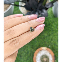 1.64 Ct. Yellowish Green Sapphire from Tanzania Life Style