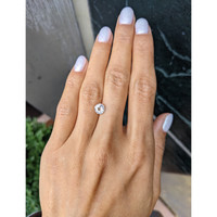 1.27 Ct. Peach Sapphire from Madagascar Life Style