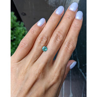 1.03 Ct. Bluish Green Sapphire from Madagascar Life Style