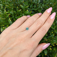 0.72 Ct. Bluish Green Sapphire from Madagascar Life Style