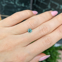 0.72 Ct. Bluish Green Sapphire from Madagascar Life Style