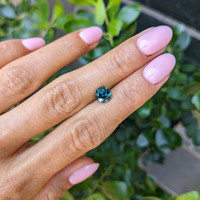 2.05 Ct. Bluish Green Sapphire from Madagascar Life Style