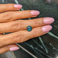 3.45 Ct. Yellowish Green Sapphire from Madagascar Life Style