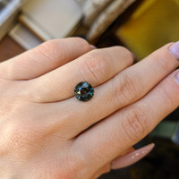 2.76 Ct. Bluish Green Sapphire from Madagascar Life Style