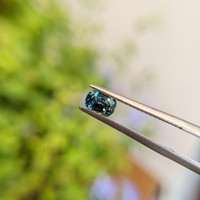 0.85 Ct. Greenish Blue Sapphire from Madagascar Life Style