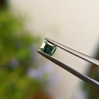 0.62 Ct. Bluish Green Sapphire from Madagascar Life Style