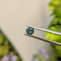 0.88 Ct. Bluish Green Sapphire from Madagascar Life Style