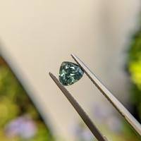 1.06 Ct. Bluish Green Sapphire from Madagascar Life Style