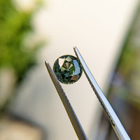 1.55 Ct. Bluish Green Sapphire from Madagascar Life Style