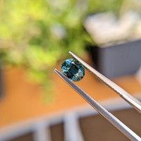 1.55 Ct. Bluish Green Sapphire from Madagascar Life Style