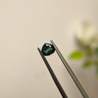 0.82 Ct. Bluish Green Sapphire from Madagascar Life Style