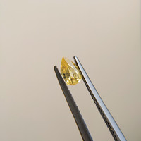0.46 Ct. Orangish Yellow Sapphire from Madagascar Life Style