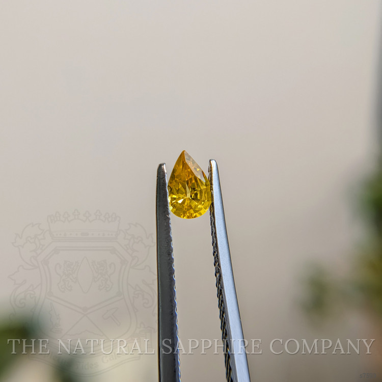 0.36 Ct. Orangish Yellow Sapphire from Madagascar