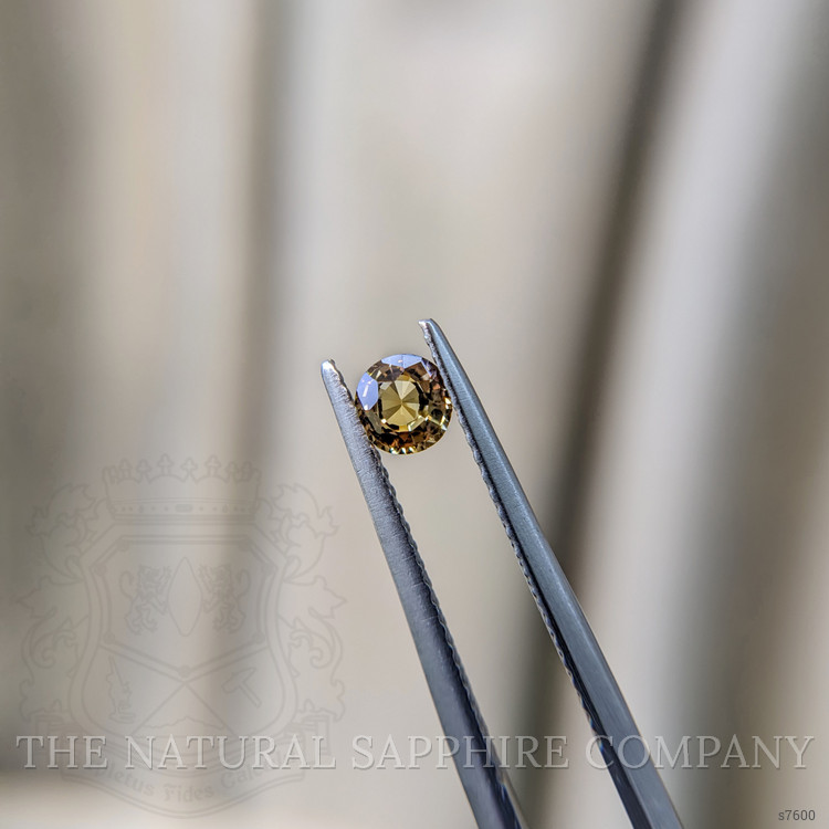 0.39 Ct. Greenish Brown Sapphire from Madagascar