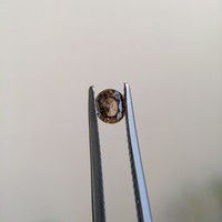 0.55 Ct. Brown Sapphire from Madagascar Life Style