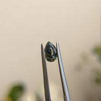 1.07 Ct. Bluish Green Sapphire from Madagascar Life Style