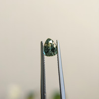 1.11 Ct. Bluish Green Sapphire from Madagascar Life Style