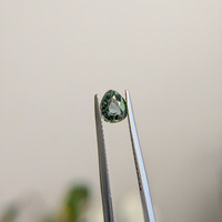 0.96 Ct. Green Sapphire from Madagascar Life Style