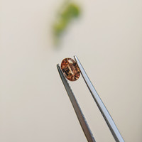 0.56 Ct. Orangish Brown Sapphire from Madagascar Life Style