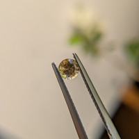 0.53 Ct. Yellowish Brown Sapphire from Madagascar Life Style