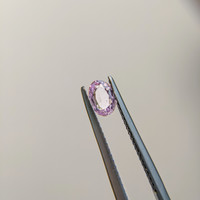 0.61 Ct. Pinkish Purple Sapphire from Madagascar Life Style