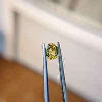 0.59 Ct. Orangish Yellow Sapphire from Madagascar Life Style