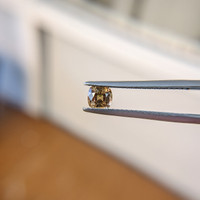 0.59 Ct. Orangish Brown Sapphire from Madagascar Life Style