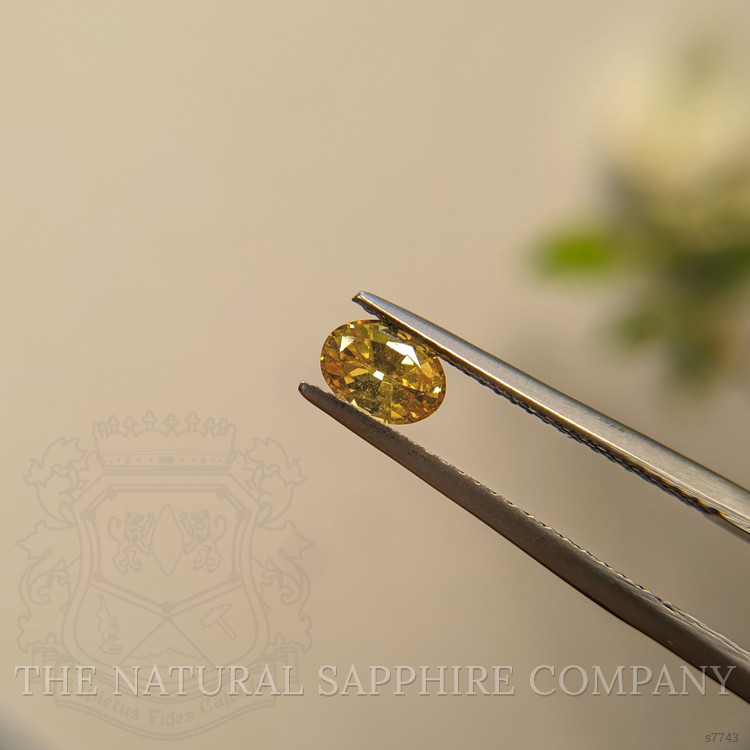 0.77 Ct. Orangish Yellow Sapphire from Madagascar