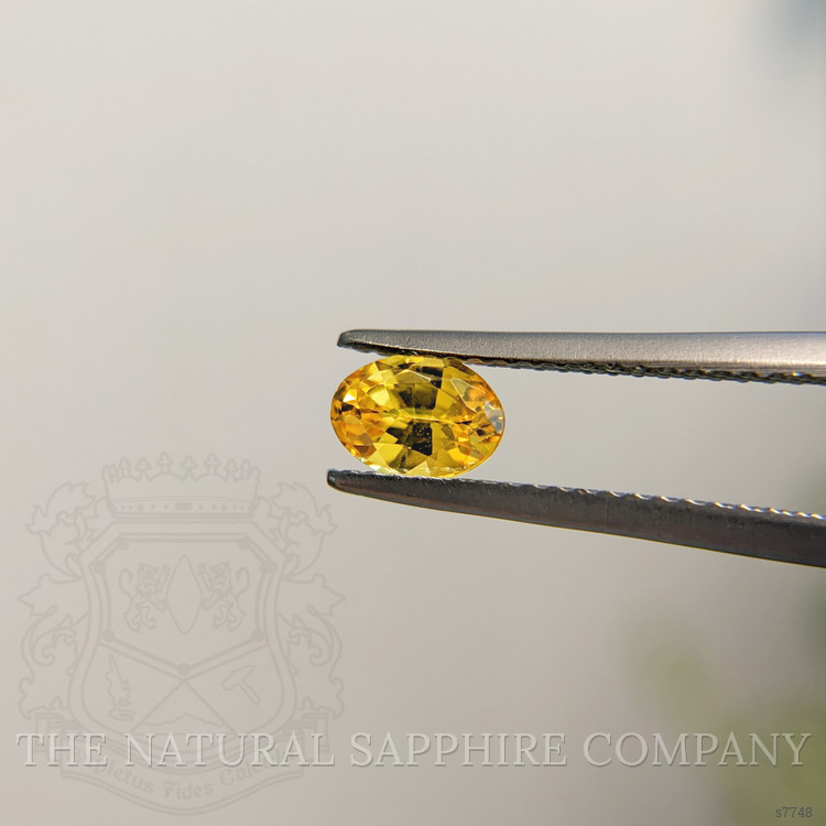 0.79 Ct. Orangish Yellow Sapphire from Madagascar