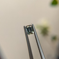 0.42 Ct. Bluish Green Sapphire from Madagascar Life Style